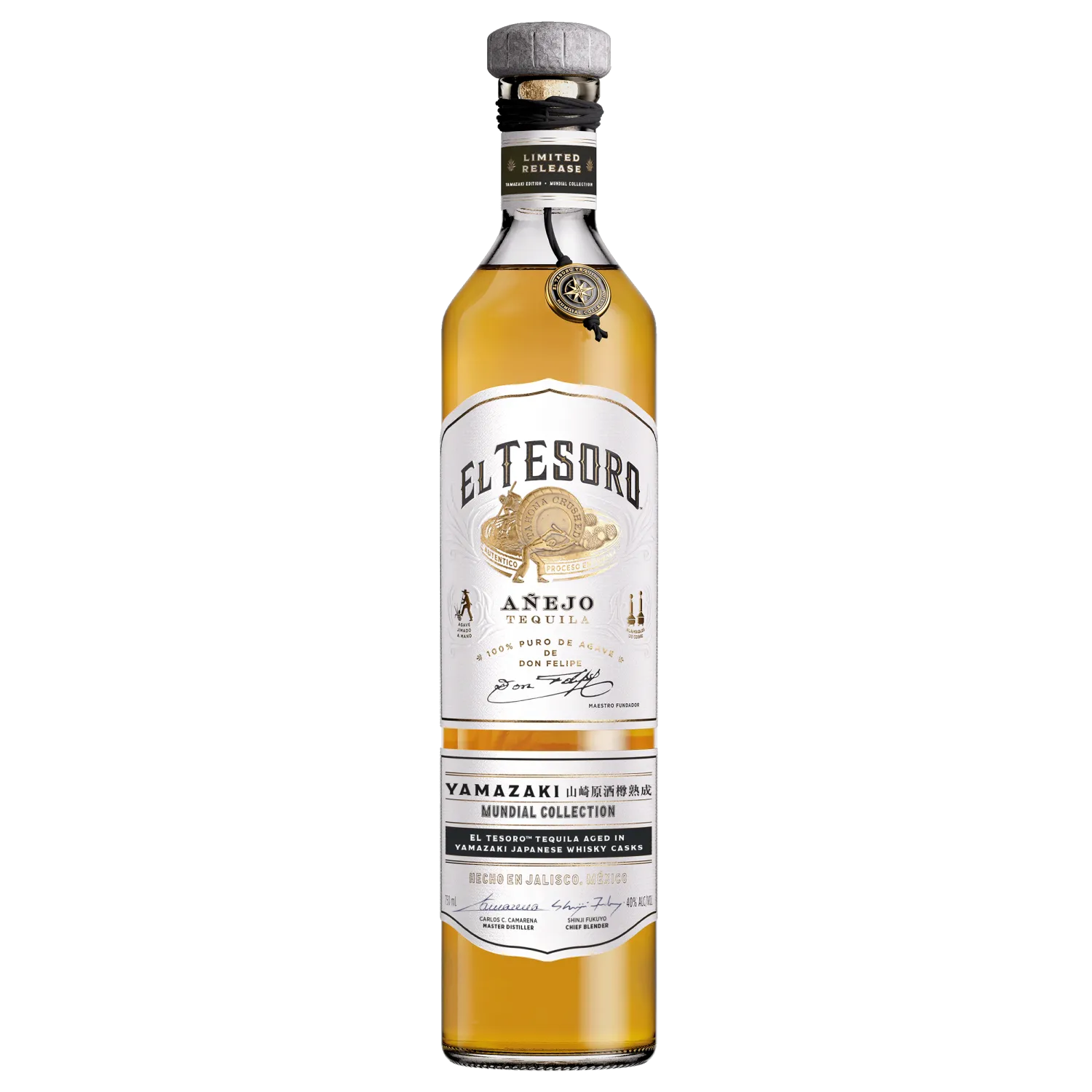 A tall, clear bottle of El Tesoro Tequila’s Mundial Limited Edition Anejo Yamazaki Finished features a gold and white label, a secondary label noting Yamazaki cask aging near the base, a silver cap, and golden tequila inside.
