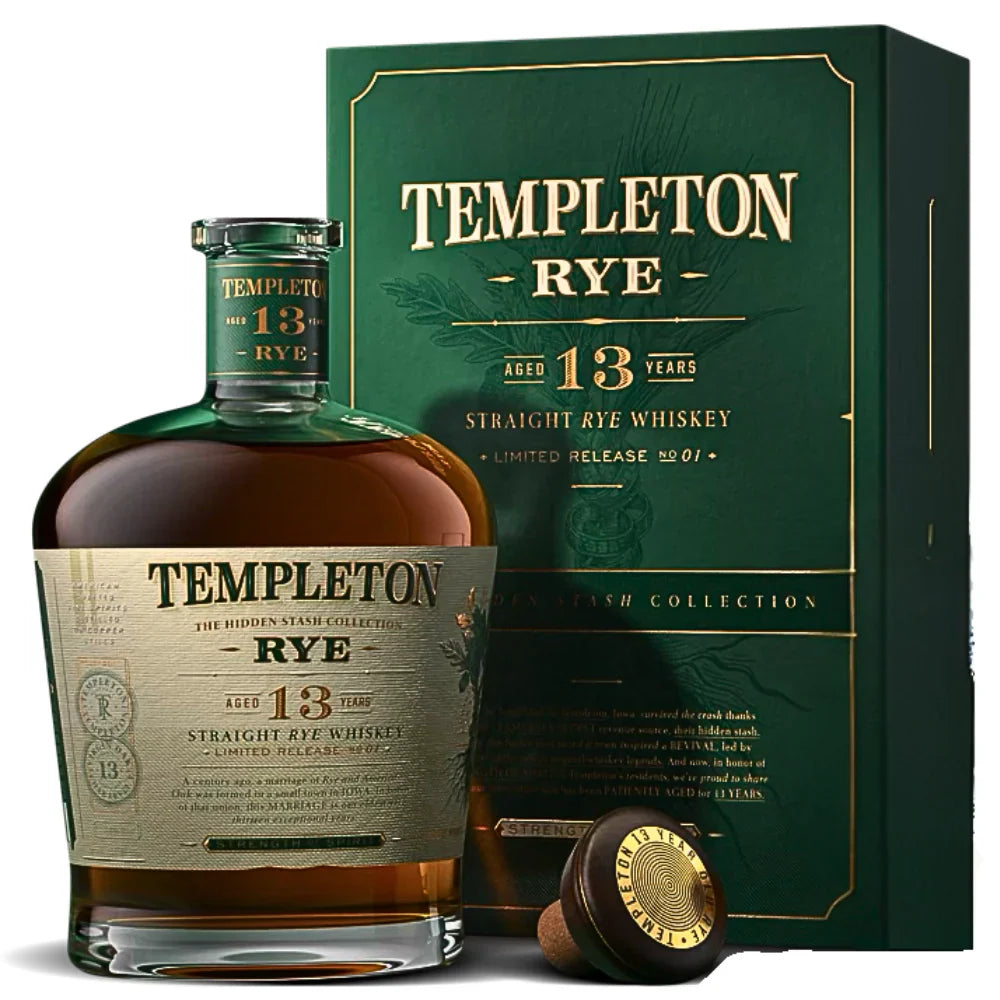A bottle of Templeton Rye The Hidden Stash Collection 13 Year Old Rye with a cork and its green and gold box, featuring vintage-style labels and text noting it as a limited release aged 13 years.