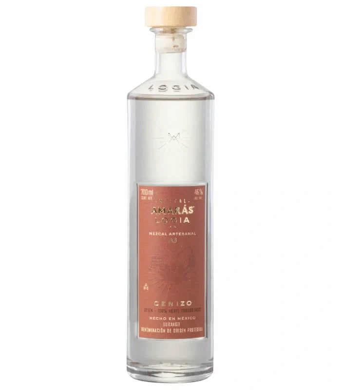 A clear glass bottle of Amaras Mezcal Joven Logia Ma Cenizo A3 (700mL) with a wooden cap and brown label featuring product details. The upright bottle, filled with clear liquid, is shown against a white background.