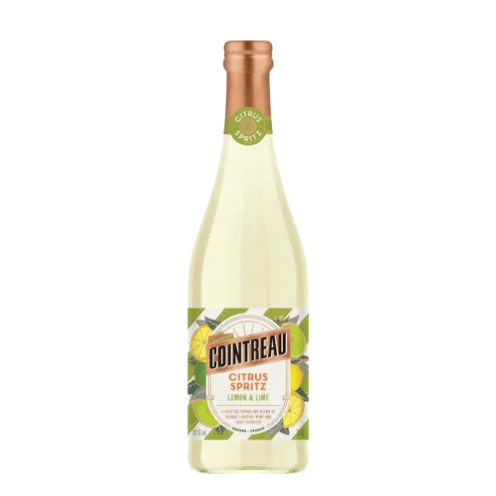 Cointreau Citrus Spritz Lemon & Lime by Cointreau comes in a pale yellow beverage, with a copper-colored cap and a label featuring green leaves and citrus fruit illustrations.